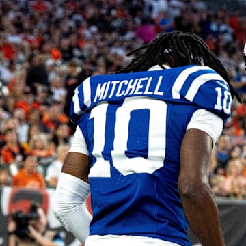 Indianapolis Colts running back Jonathan Taylor (28) and Indianapolis Colts wide receiver Adonai Mitchell (10) celebrate after scoring a touchdown in the first quarter between the Cincinnati Bengals and the Indianapolis Colts at Paycor Stadium in Cincinnati on Thursday, Aug. 22, 2024.