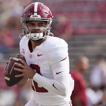 Sep 14, 2024; Madison, Wisconsin, USA;  Alabama Crimson Tide quarterback Dylan Lonergan (12) during warmups prior to the game against the Wisconsin Badgers at Camp Randall Stadium. Mandatory Credit: Jeff Hanisch-Imagn Images