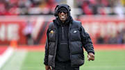 Nov 25, 2023; Salt Lake City, Utah, USA; Colorado Buffaloes head coach Deion 'Coach Prime' Sanders on the field against the Utah Utes at Rice-Eccles Stadium. Mandatory Credit: Christopher Creveling-Imagn Images