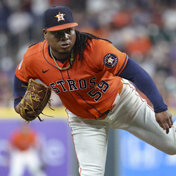 May 30, 2025; Houston, Texas, USA; Houston Astros starting pitcher Framber Valdez (59) delivers a pitch during the second inning against the Tampa Bay Rays at Daikin Park. Mandatory Credit: Troy Taormina-Imagn Images