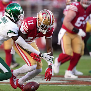 Sep 9, 2024; Santa Clara, California, USA; New York Jets cornerback Sauce Gardner (1) defends a pass to San Francisco 49ers wide receiver Brandon Aiyuk (11) during the first quarter at Levi's Stadium. 