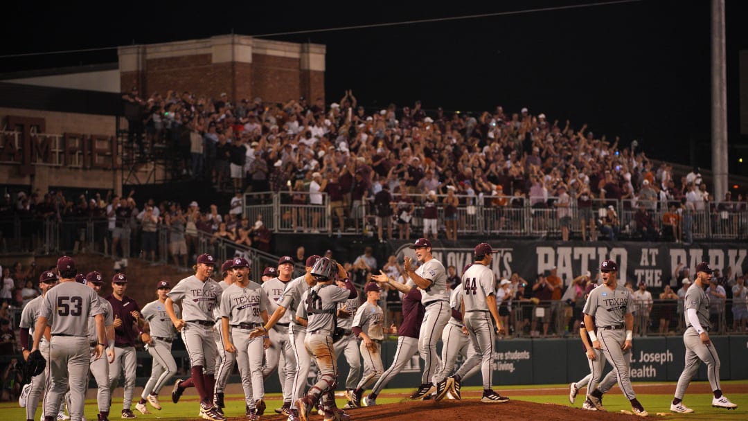 June 1, 2024; College Station, TX, USA; Texas A&M Aggies celebrate a 4-2 win against the Texas Longhorns during the second round in the NCAA baseball College Station Regional at Olsen Field College Station. Mandatory Credit: Dustin Safranek-USA TODAY Sports