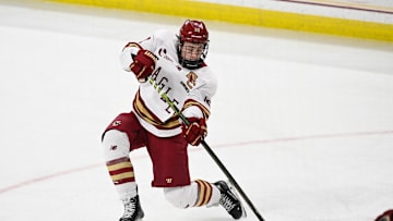 Feb 28, 2025; Chestnut Hill, MA, USA; Boston College forward James Hagens (10) shoots the puck against the University of New Hampshire Wildcats during the third period at Conte Forum. Mandatory Credit: Eric Canha-Imagn Images