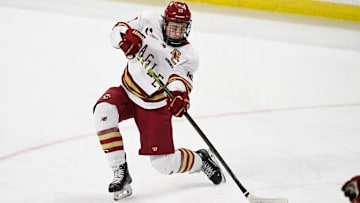 Feb 28, 2025; Chestnut Hill, MA, USA; Boston College forward James Hagens (10) shoots the puck against the University of New Hampshire Wildcats during the third period at Conte Forum. Mandatory Credit: Eric Canha-Imagn Images
