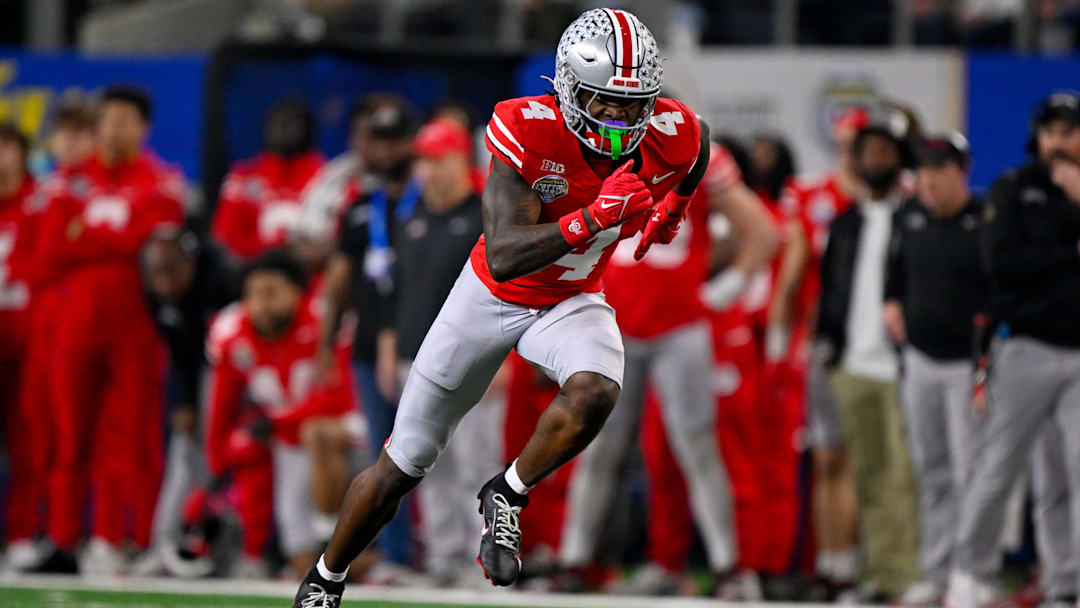 Jan 10, 2025; Arlington, TX, USA; Ohio State Buckeyes wide receiver Jeremiah Smith (4) in action during the game between the Texas Longhorns and the Ohio State Buckeyes at AT&T Stadium.