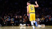 Los Angeles Lakers guard Luka Doncic did everything he could to keep his team close in their opening night loss to the Golden State Warriors. 