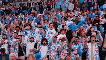 Dec 2, 2025; Oxford, Mississippi, USA; Mississippi Rebels fans cheer as Mississippi Rebels head coach football Pete Golding is introduced during a timeout during the first half against the Miami Hurricanes at The Sandy and John Black Pavilion at Ole Miss. Mandatory Credit: Petre Thomas-Imagn Images