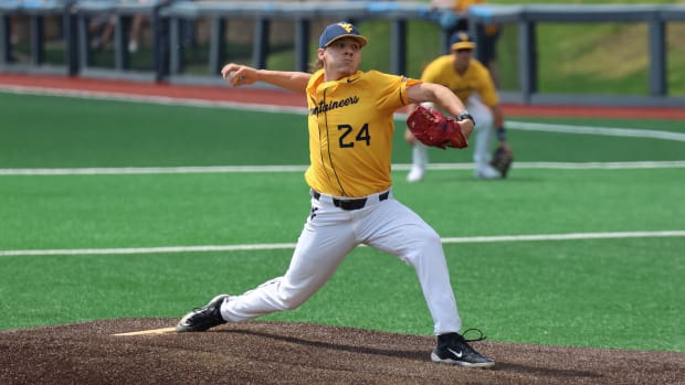 West Virginia junior Aidan Major tosses a pitch against Baylor. Major went 5.2 innings and had five strikeouts on the afternoon to pick up his fourth of the season. 