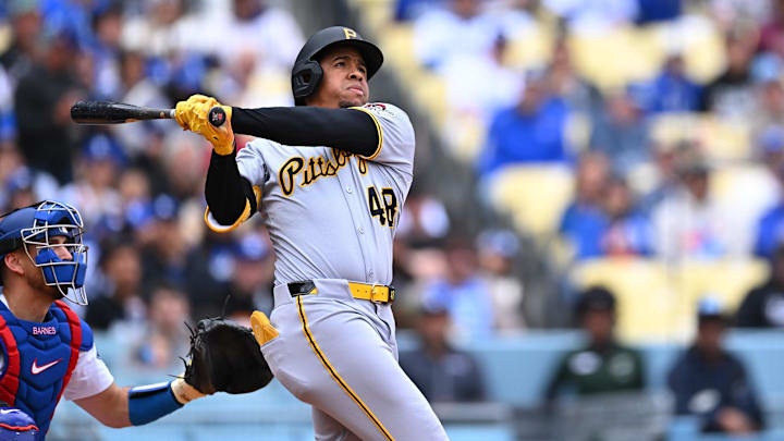 Apr 27, 2025; Los Angeles, California, USA; Pittsburgh Pirates first baseman Enmanuel Valdez (48) hits a home run during the first inning against the Los Angeles Dodgers at Dodger Stadium. Mandatory Credit: Jonathan Hui-Imagn Images