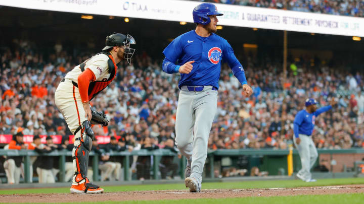 Jun 24, 2024; San Francisco, California, USA; Chicago Cubs outfielder Cody Bellinger (24) scores a run during the third inning against the San Francisco Giants at Oracle Park. All Giants players wore the number 24 in honor of Giants former player Willie Mays.