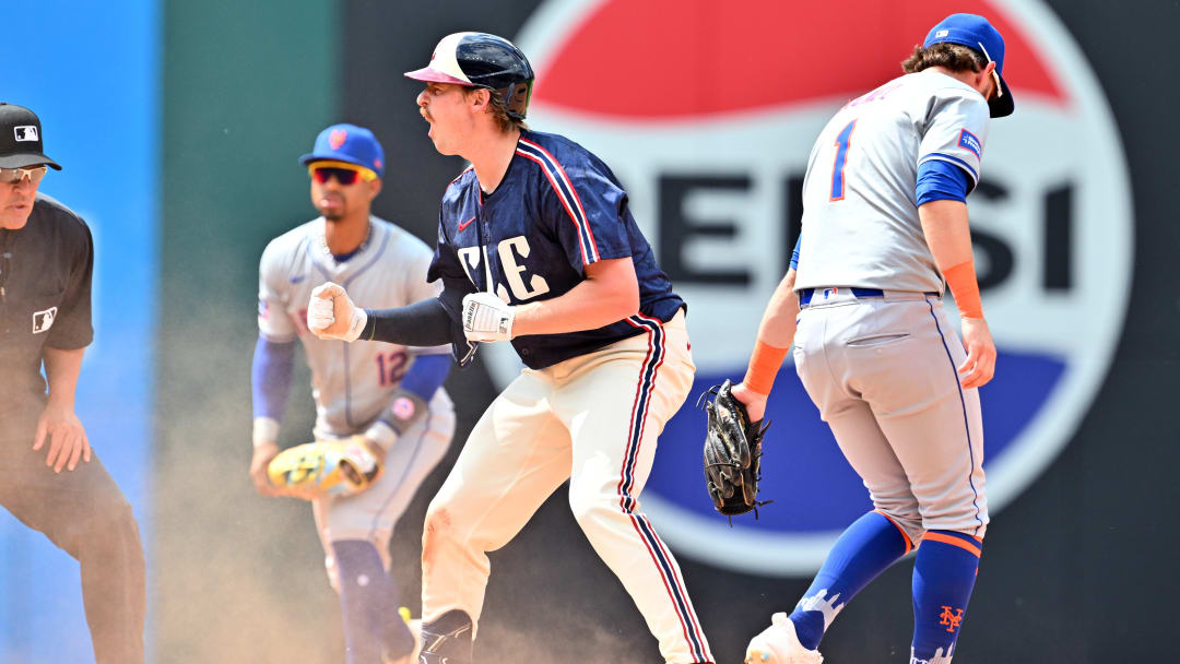1B Kyle Manzardo celebrates on second base.