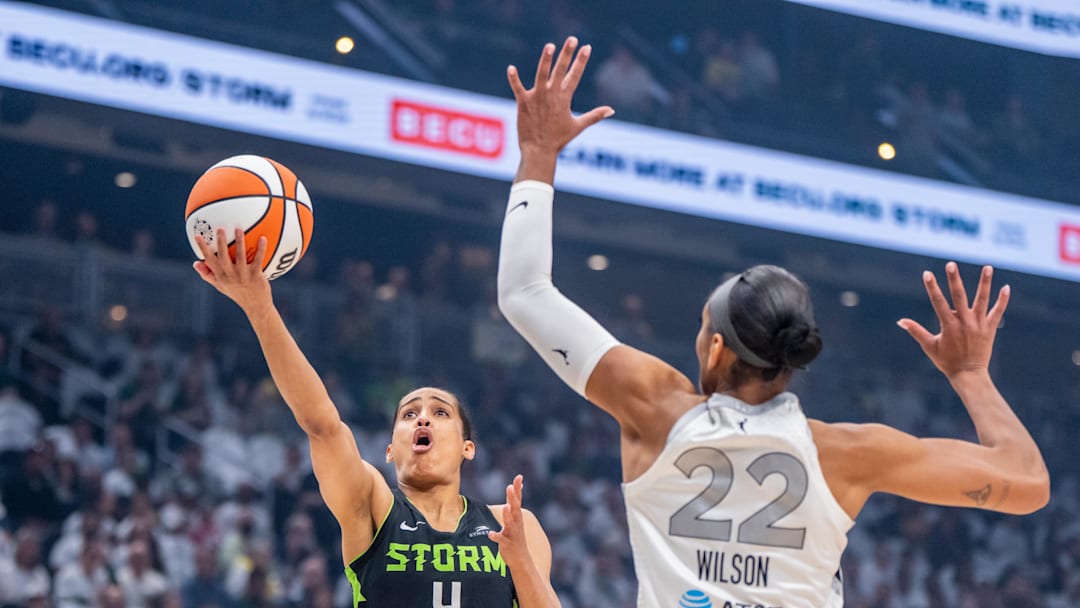 Sep 16, 2025; Seattle, Washington, USA; Seattle Storm guard Skylar Diggins (4) shoots the ball against Las Vegas Aces center A'ja Wilson (22) during the first half in game two of round one for the 2025 WNBA Playoffs at Climate Pledge Arena. Mandatory Credit: Stephen Brashear-Imagn Images