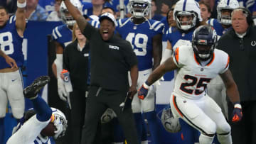 Indianapolis Colts cornerback Kenny Moore II (23) intercepts a ball meant for Denver Broncos running back Samaje Perine (25) during a preseason game Sunday, Aug. 11, 2024, at Lucas Oil Stadium in Indianapolis.