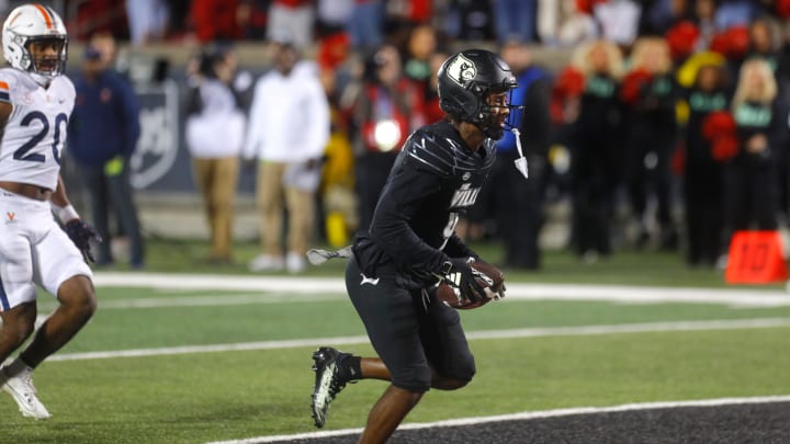 Louisville   s Ahmari Huggins-Bruce scored a touchdown against Virginia in L & N Stadium. 
Nov. 9, 2023