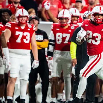 Sep 14, 2024; Lincoln, Nebraska, USA; Nebraska Cornhuskers running back Dante Dowdell (23) runs against the Northern Iowa Panthers during the third quarter at Memorial Stadium. 