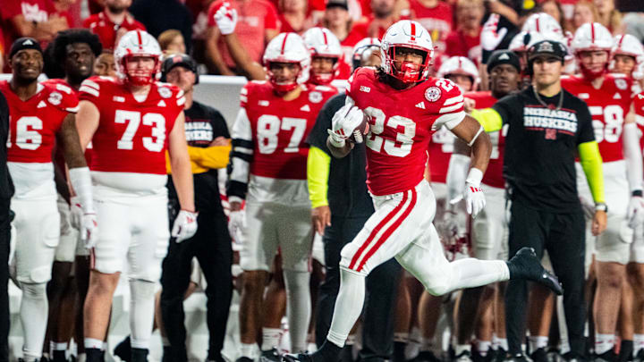 Sep 14, 2024; Lincoln, Nebraska, USA; Nebraska Cornhuskers running back Dante Dowdell (23) runs against the Northern Iowa Panthers during the third quarter at Memorial Stadium. 