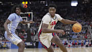 Dia turns the corner on North Carolina guard Ian Jackson during the first round of the NCAA men’s basketball tournament.