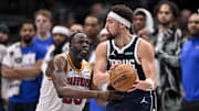 Feb 12, 2025; Dallas, Texas, USA; Golden State Warriors forward Draymond Green (23) and Dallas Mavericks guard Klay Thompson (31) in action during the game between the Dallas Mavericks and the Golden State Warriors at the American Airlines Center. Mandatory Credit: Jerome Miron-Imagn Images