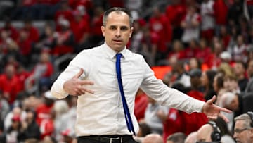 Mar 9, 2025; St. Louis, Missouri, USA;  Drake Bulldogs head coach Ben McCollum reacts after his team made a three point shot against the Bradley Braves during the first half of the Missouri Valley Conference Tournament Championship at Enterprise Center. Mandatory Credit: Jeff Curry-Imagn Images