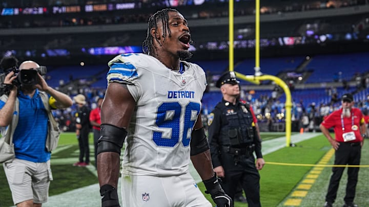 Detroit Lions defensive end Al-Quadin Muhammad (96) shouts “Let’s Go” as he exits the field after 38-30 win over Baltimore Ravens at M&T Bank Stadium in Baltimore, Md. on Monday, Sept. 22, 2025.