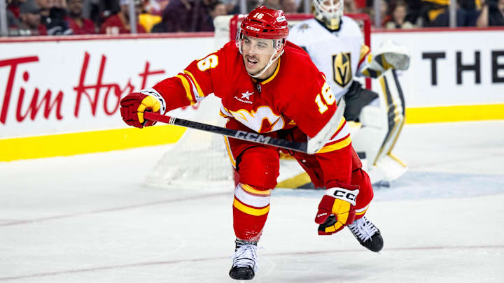 Apr 5, 2025; Calgary, Alberta, CAN; Calgary Flames center Morgan Frost (16) skates against the Vegas Golden Knights during the second period at Scotiabank Saddledome. Mandatory Credit: Brett Holmes-Imagn Images