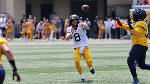 West Virginia University redshirt sophomore quarterback Nicco Marchiol throws a pass during the 2024 Gold-Blue Spring Game.