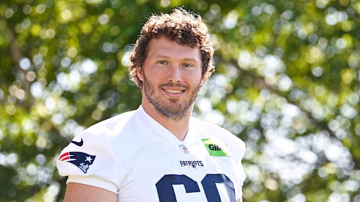 Jul 23, 2025; Foxborough, MA, USA; New England Patriots guard Cole Strange (69) walks to the practice field for training camp at Gillette Stadium. Mandatory Credit: Eric Canha-Imagn Images Jul 23, 2025; Foxborough, MA, USA; New England Patriots guard Cole Strange (69) walks to the practice field for training camp at Gillette Stadium. Mandatory Credit: Eric Canha-Imagn Images