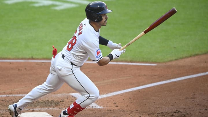 Aug 14, 2024; Cleveland, Ohio, USA; Cleveland Guardians left fielder Steven Kwan (38) singles in the fifth inning against the Chicago Cubs at Progressive Field. Mandatory Credit: David Richard-USA TODAY Sports