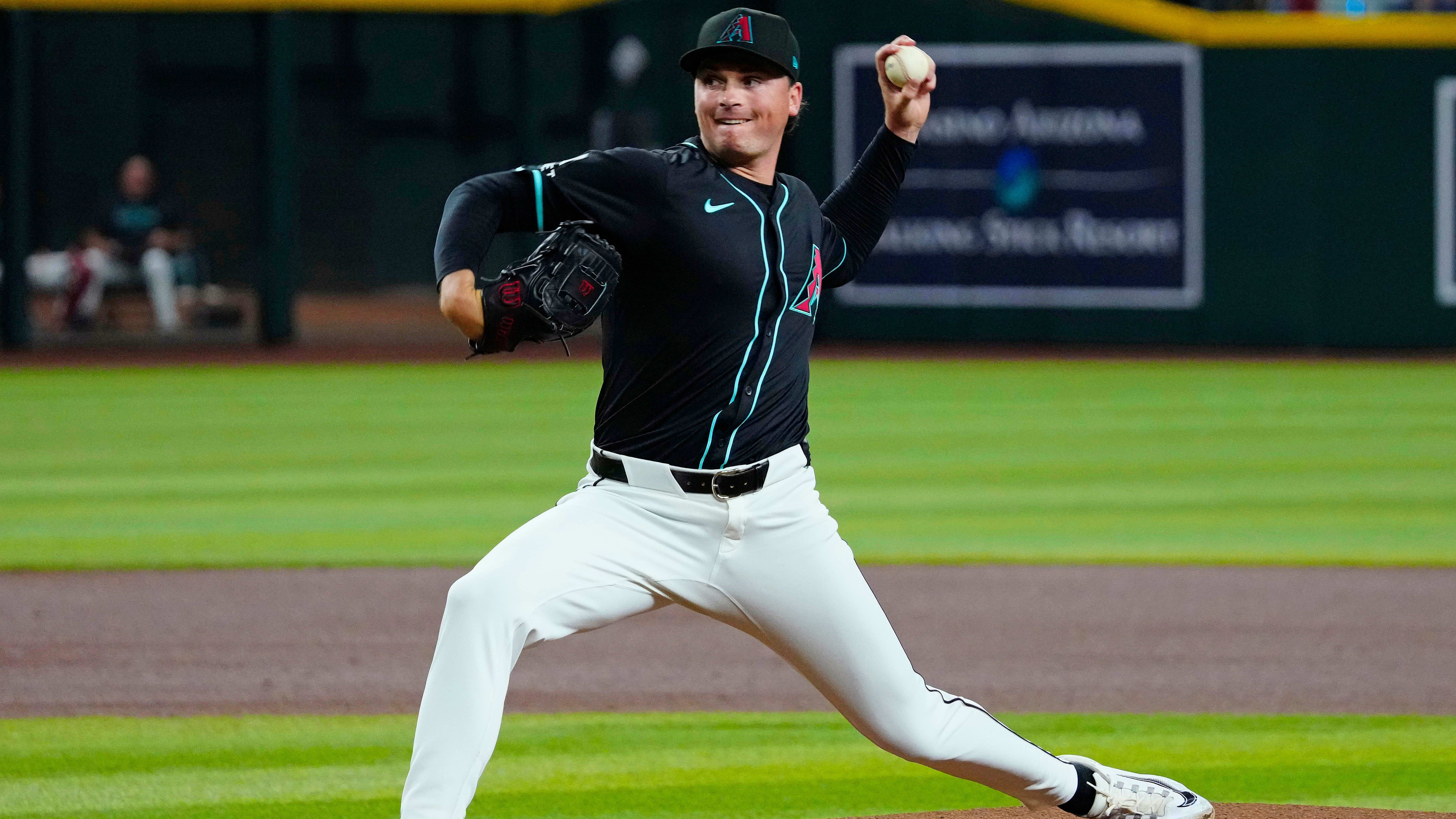 Tommy Henry pitching for the D-backs