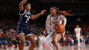 Jan 12, 2025; Los Angeles, California, USA; USC Trojans forward Kiki Iriafen (44) drives to the basket as Penn State Nittany Lions forward Grace Hall (7) moves in to defend during the fourth quarter at Galen Center. Mandatory Credit: Robert Hanashiro-Imagn Images