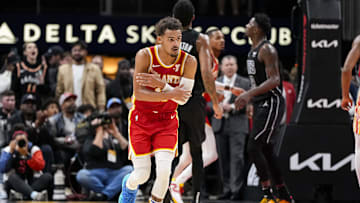 Atlanta Hawks guard Trae Young reacts after making a clutch shot against the Brooklyn Nets during overtime at State Farm Arena. 