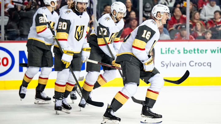 Apr 5, 2025; Calgary, Alberta, CAN; Vegas Golden Knights left wing Pavel Dorofeyev (16) celebrates with teammates after scoring a goal against the Calgary Flames during the first period at Scotiabank Saddledome. Mandatory Credit: Brett Holmes-Imagn Images