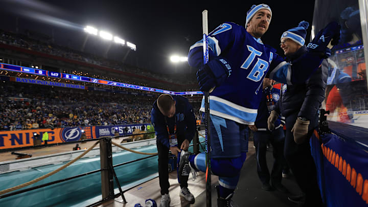 Feb 1, 2026; Tampa Bay, Florida, USA; Tampa Bay Lightning defenseman Ryan McDonagh (27) gets a skate adjustment prior to a game against the Boston Bruins in the 2026 Stadium Series ice hockey game at Raymond James Stadium. Mandatory Credit: Kim Klement Neitzel-Imagn Images