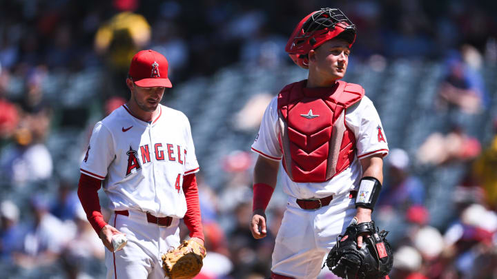 Aug 4, 2024; Anaheim, California, USA; Los Angeles Angels catcher Matt Thaiss (21) and pitcher Griffin Canning (47) meet at the mound during the fifth inning at Angel Stadium. Mandatory Credit: Jonathan Hui-USA TODAY Sports