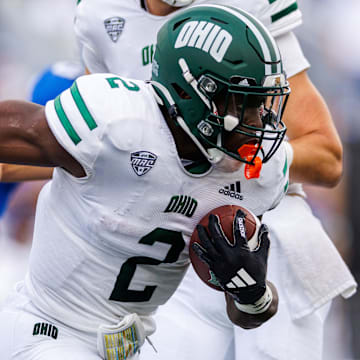 Sep 21, 2024; Lexington, Kentucky, USA; Ohio Bobcats running back Anthony Tyus III (2) runs the ball during the first quarter against the Kentucky Wildcats at Kroger Field. Mandatory Credit: Jordan Prather-Imagn Images