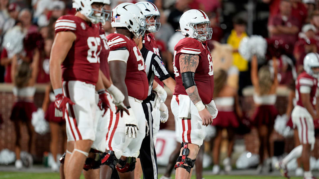 Oklahoma Sooners offensive lineman Joshua Bates (64) stands over the ball before a play during a college football game between the University of Oklahoma Sooners (OU) and the Houston Cougars at Gaylord Family – Oklahoma Memorial Stadium in Norman, Okla., Saturday, Sept. 7, 2024.