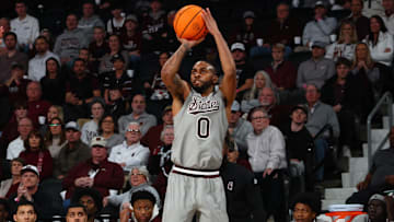 Feb 18, 2025; Starkville, Mississippi, USA; Mississippi State Bulldogs guard Claudell Harris Jr. (0) shoots during the second half against the Texas A&M Aggies at Humphrey Coliseum. Mandatory Credit: Petre Thomas-Imagn Images