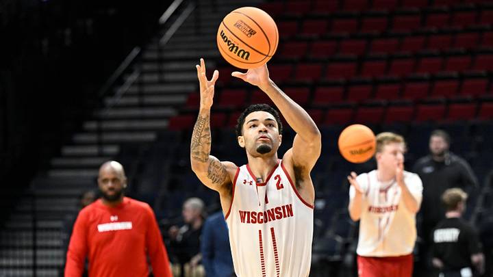 Mar 18, 2026; Portland, OR, USA; Wisconsin Badgers guard Nick Boyd (2) shoots the ball during a practice session ahead of the first round of the men's 2026 NCAA Tournament at Moda Center. Mandatory Credit: Craig Strobeck-Imagn Images