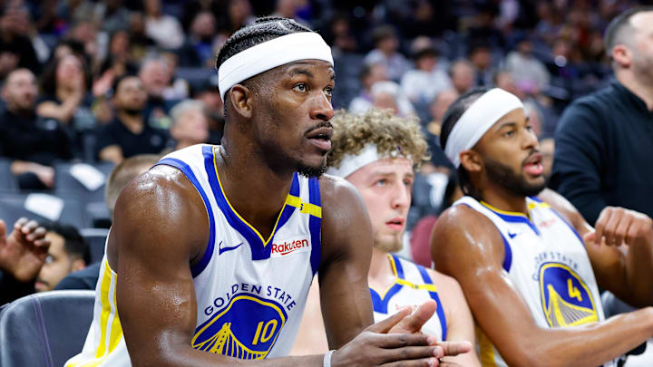 Golden State Warriors forward Jimmy Butler III (10) claps from the bench during the fourth quarter against the Sacramento Kings at Golden 1 Center.
