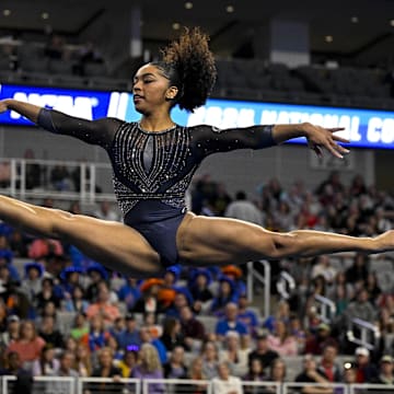 Apr 20, 2024; Fort Worth, TX, USA; University of California Golden Bears gymnast eMjae Frazier performs on floor exercise during the 2024 Womens National Gymnastics Championship at Dickies Arena. Mandatory Credit: Jerome Miron-Imagn Images