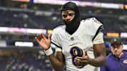 Nov 9, 2025; Minneapolis, Minnesota, USA; Baltimore Ravens quarterback Lamar Jackson (8) comes off the field after the game against the Minnesota Vikings at U.S. Bank Stadium. Mandatory Credit: Jeffrey Becker-Imagn Images