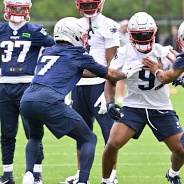Jun 9, 2025; Foxborough, MA, USA; New England Patriots wide receiver Kayshon Boutte (9) works with cornerback Carlton Davis III (7) and cornerback Christian Gonzalez (0) during minicamp at Gillette Stadium. Mandatory Credit: Eric Canha-Imagn Images