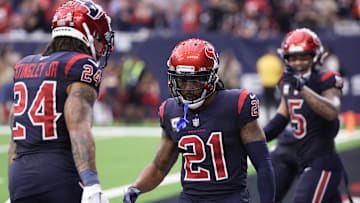 Nov 19, 2023; Houston, Texas, USA; Houston Texans cornerback Derek Stingley Jr. (24) celebrates cornerback Steven Nelson (21) defensive play against the Arizona Cardinals  in the second half at NRG Stadium. Mandatory Credit: Thomas Shea-Imagn Images