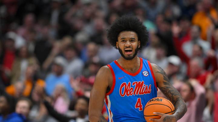 Mar 13, 2026; Nashville, TN, USA;  Mississippi Rebels forward James Scott (4) celebrates after stopping Alabama Crimson Tide with time running out during the second half at Bridgestone Arena. Mandatory Credit: Steve Roberts-Imagn Images