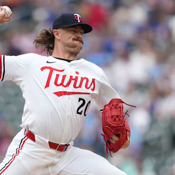 Jul 10, 2025; Minneapolis, Minnesota, USA; Minnesota Twins starting pitcher Chris Paddack (20) pitches during the first inning against the Chicago Cubs at Target Field.
