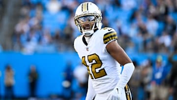 Nov 9, 2025; Charlotte, North Carolina, USA; New Orleans Saints wide receiver Chris Olave (12) looks on during the fourth quarter against the Carolina Panthers at Bank of America Stadium. Mandatory Credit: Bob Donnan-Imagn Images
