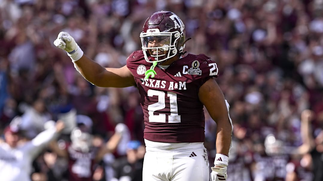 Dec 20, 2025; College Station, TX, USA; Texas A&M Aggies linebacker Taurean York (21) celebrates during the game between the Aggies and the Hurricanes at Kyle Field. Mandatory Credit: Jerome Miron-Imagn Images