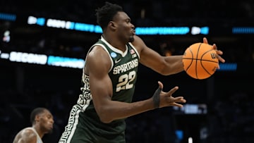 March 21, 2024, Charlotte, NC, USA; Michigan State Spartans center Mady Sissoko (22) rebounds the ball against the Mississippi State Bulldogs in the first round of the 2024 NCAA Tournament at the Spectrum Center. Mandatory Credit: Bob Donnan-Imagn Images