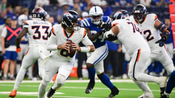 Aug 11, 2024; Indianapolis, Indiana, USA;  Denver Broncos quarterback Jarrett Stidham (8) prepares to throw the ball during the first quarter against the Indianapolis Colts at Lucas Oil Stadium. Mandatory Credit: Marc Lebryk-USA TODAY Sports