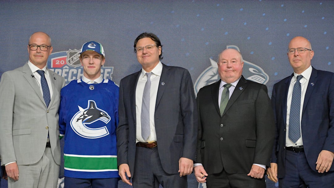 Jul 7, 2022; Montreal, Quebec, CANADA; Jonathan Lekkerimaki after being selected as the number fifteen overall pick to the Vancouver Canucks in the first round of the 2022 NHL Draft at Bell Centre. Mandatory Credit: Eric Bolte-Imagn Images